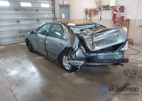 2003 Toyota Camry Le z USA, uszkodzony, nr VIN 4T1BE32K13U657571